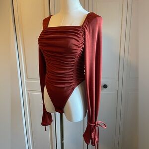 Red/orange Free People bodysuit